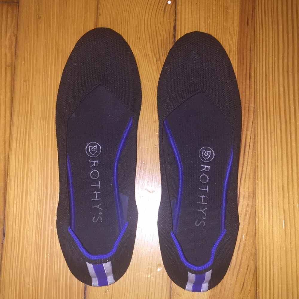 Rothy’s Black with stripe Round-toe Flats size 7